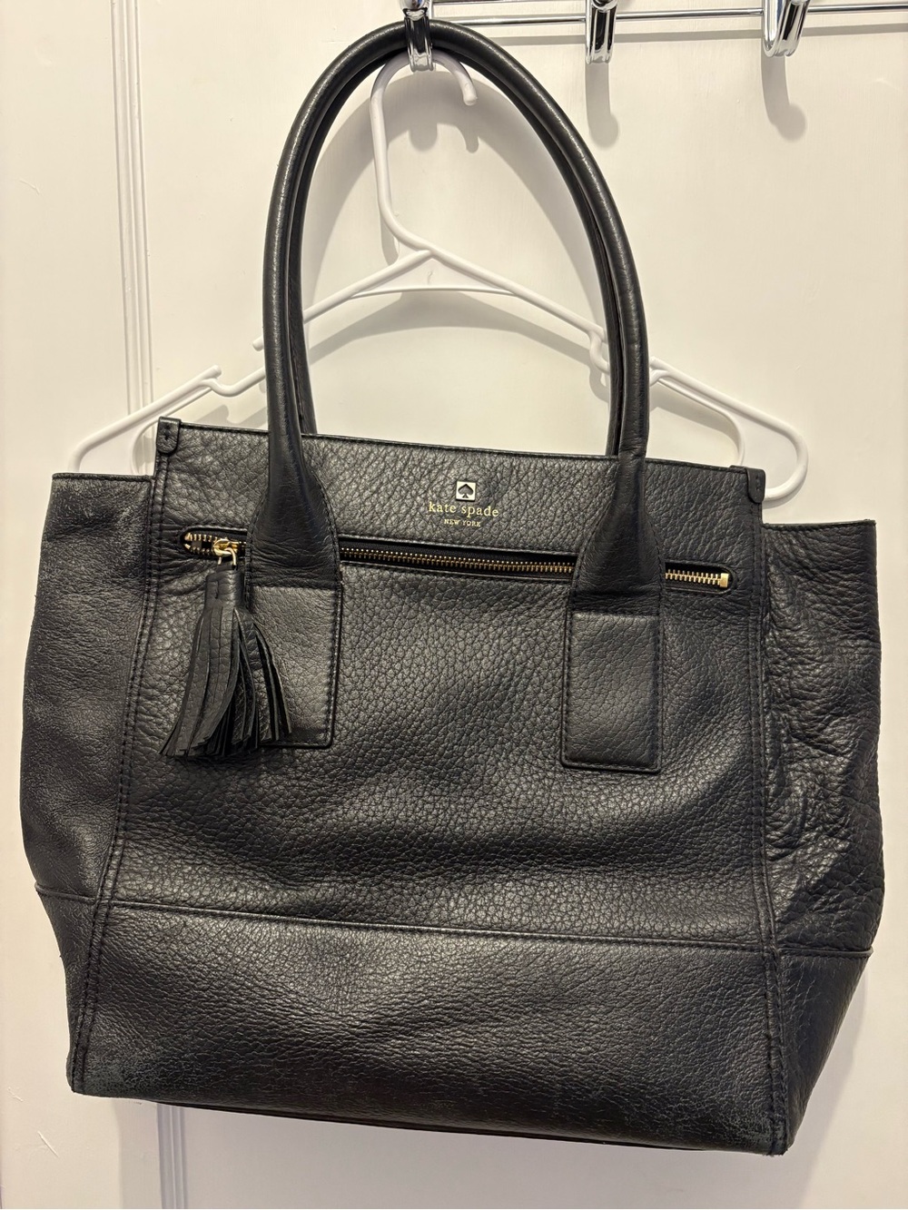 kate spade black pebbled leather tote with tassel detail